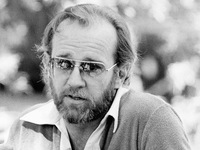 Comedian George Carlin appears at a news conference in 1978.