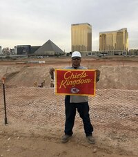 The photo from the fateful text showing Gerard DeCosta with the flag he said he buried under the field at Allegiant Stadium.