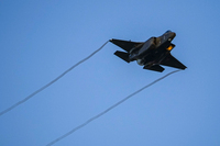 An Israeli air force F-35 warplane flies over during a graduation ceremony for new pilots in Hatzerim air force base near the city of Beersheba, Israel, June 29, 2023.